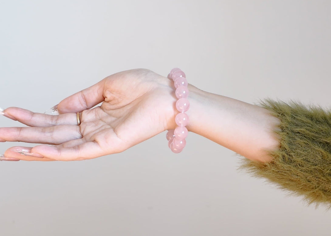Model wearing Pink Bubble Quartz rose quartz bracelets under natural light IvyBleu